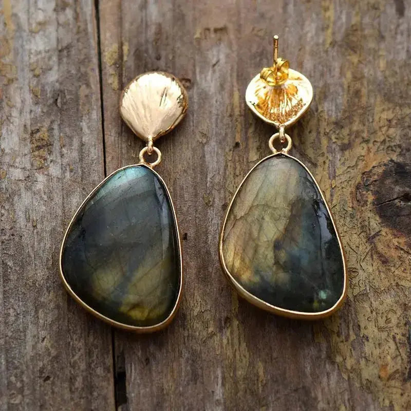 Handcrafted Labradorite drop earrings featuring unique blends of green, grey, and brown tones in each stone. 