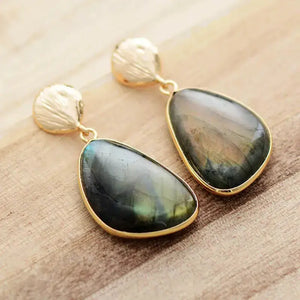 Handcrafted Labradorite drop earrings featuring unique blends of green, grey, and brown tones in each stone. 