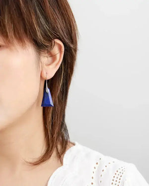 Handcrafted Lapis Lazuli trapezoid drop earrings featuring the gemstone's deep blue color and natural marbling.