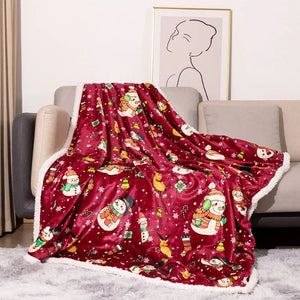 A luxurious Christmas-themed throw blanket featuring flannel on one side and soft white fleece on the other.