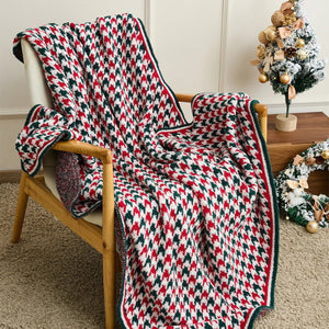 Geometric knitted throw blanket made from 100% polyester, featuring a soft, lightweight, and durable design.