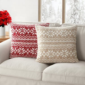 A festive cushion cover featuring a woven texture and snowflake motifs inspired by Fair Isle patterns. 